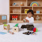 Jucărie Montessori cu eșarfe textile colorate pentru dezvoltarea motricității fine și a coordonării.
